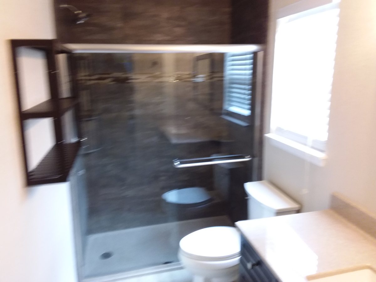 Dark Tile Spa Bath photo 2